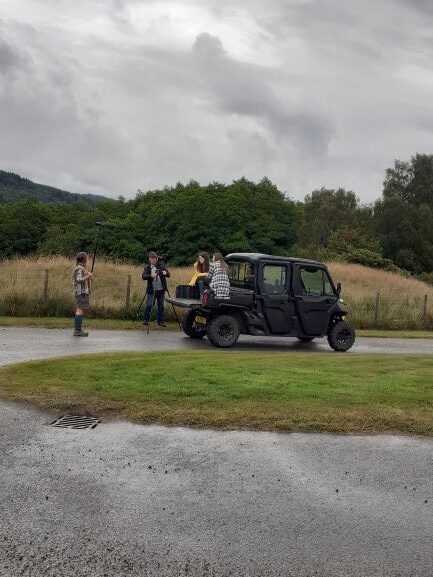 photo of all terrain buggy and people